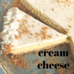 A cream cheese pie with a graham cracker crust in a glass dish, one slice served. Whipped cream decorates the edge. Text reads: cream cheese pie. get the recipe on www.theurbankitten.com.